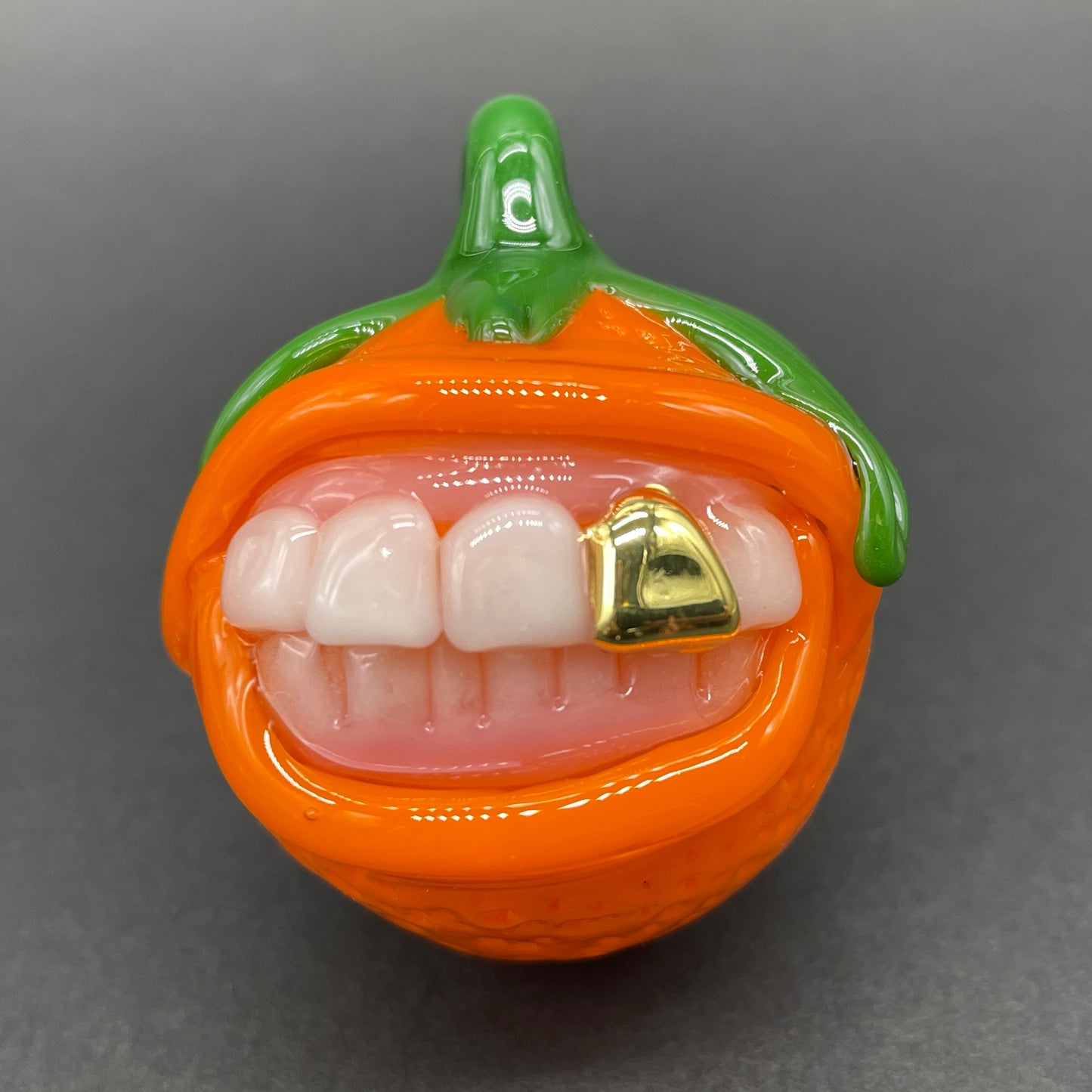Toothy orange pendant