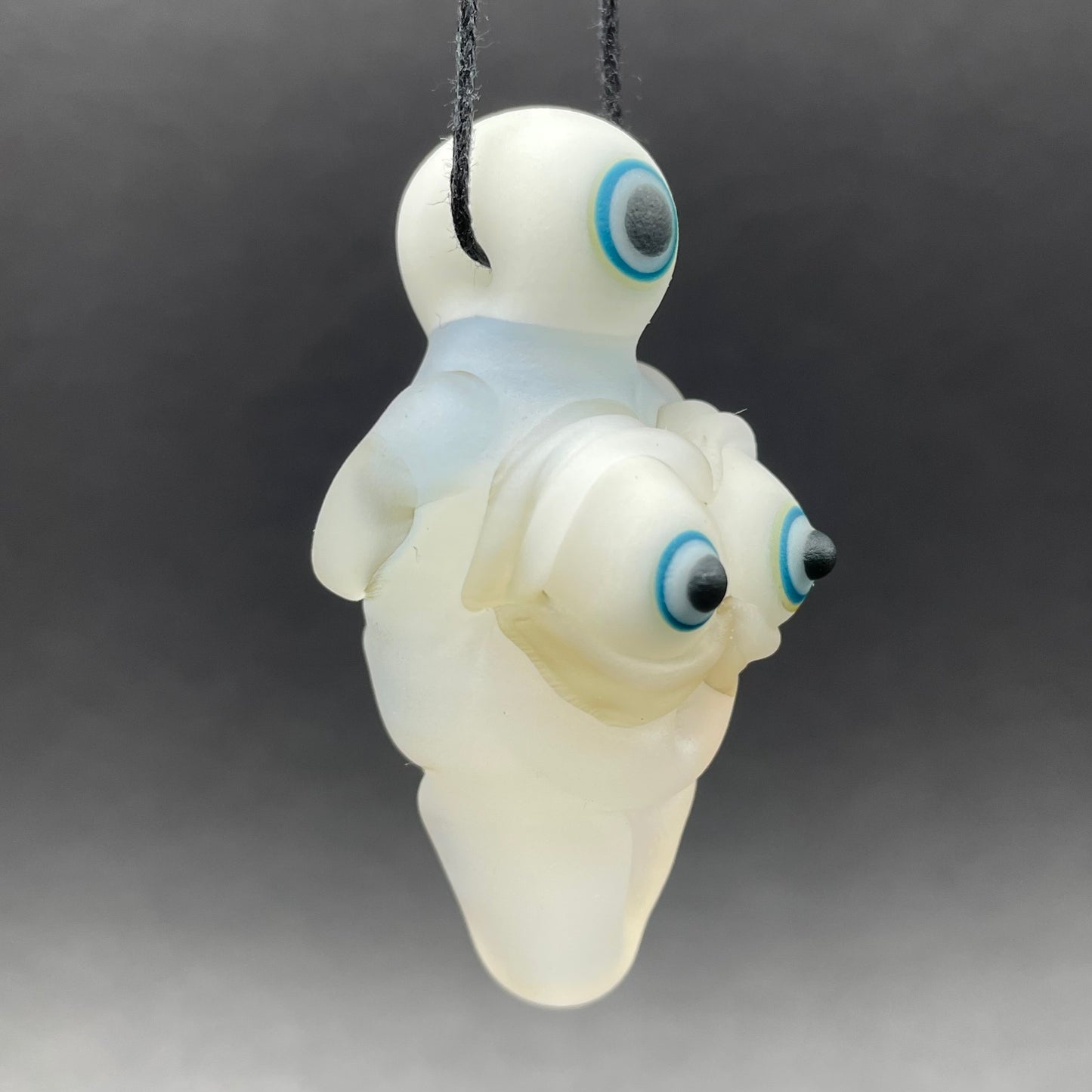 Black light reactive fertility pendant