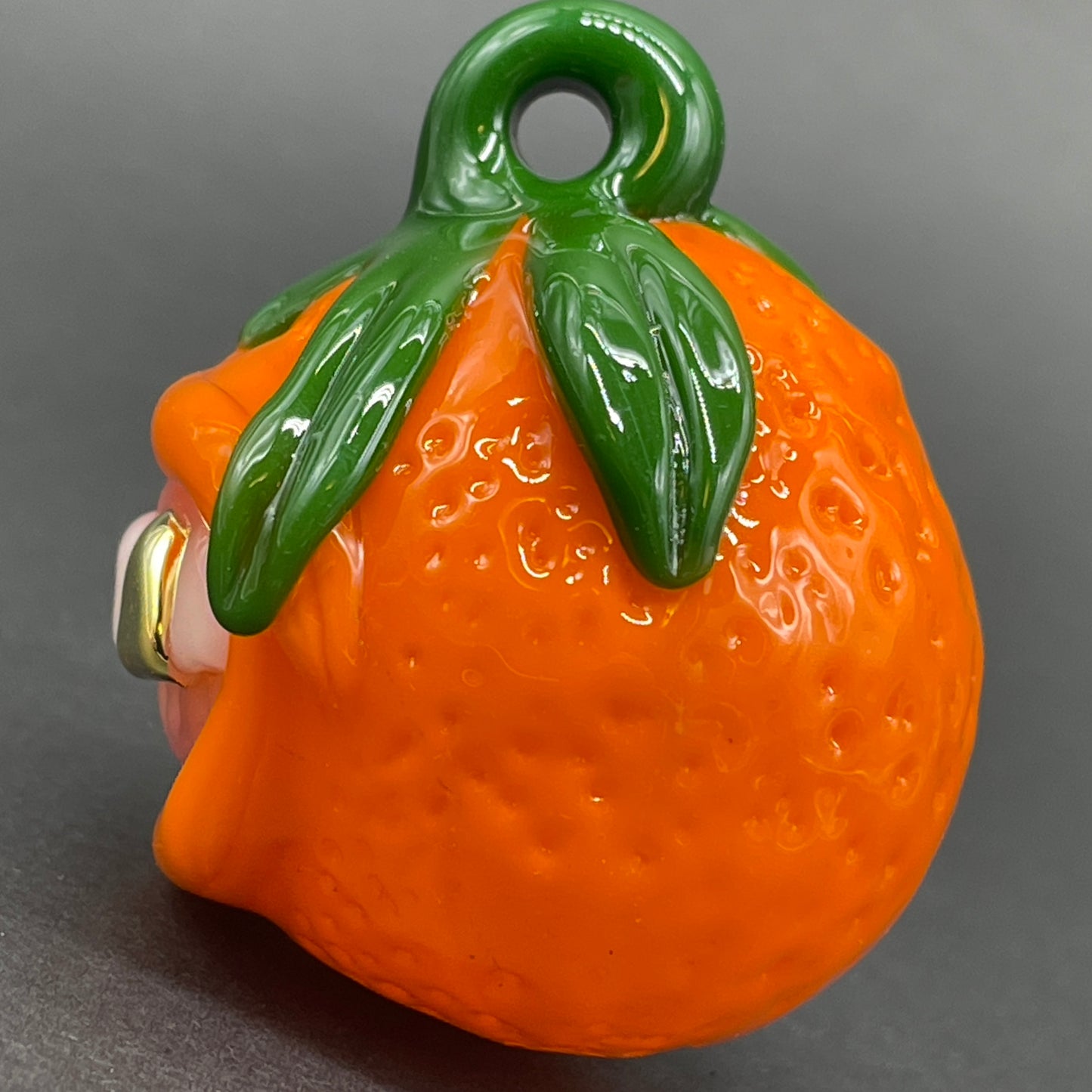 Toothy orange pendant