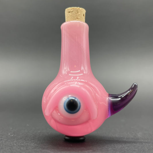 Pink cyclops potion bottle