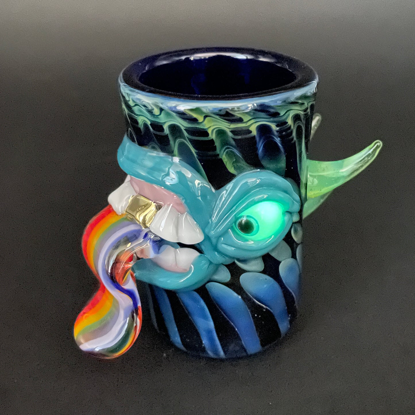 Kool aid tongue shot glass.