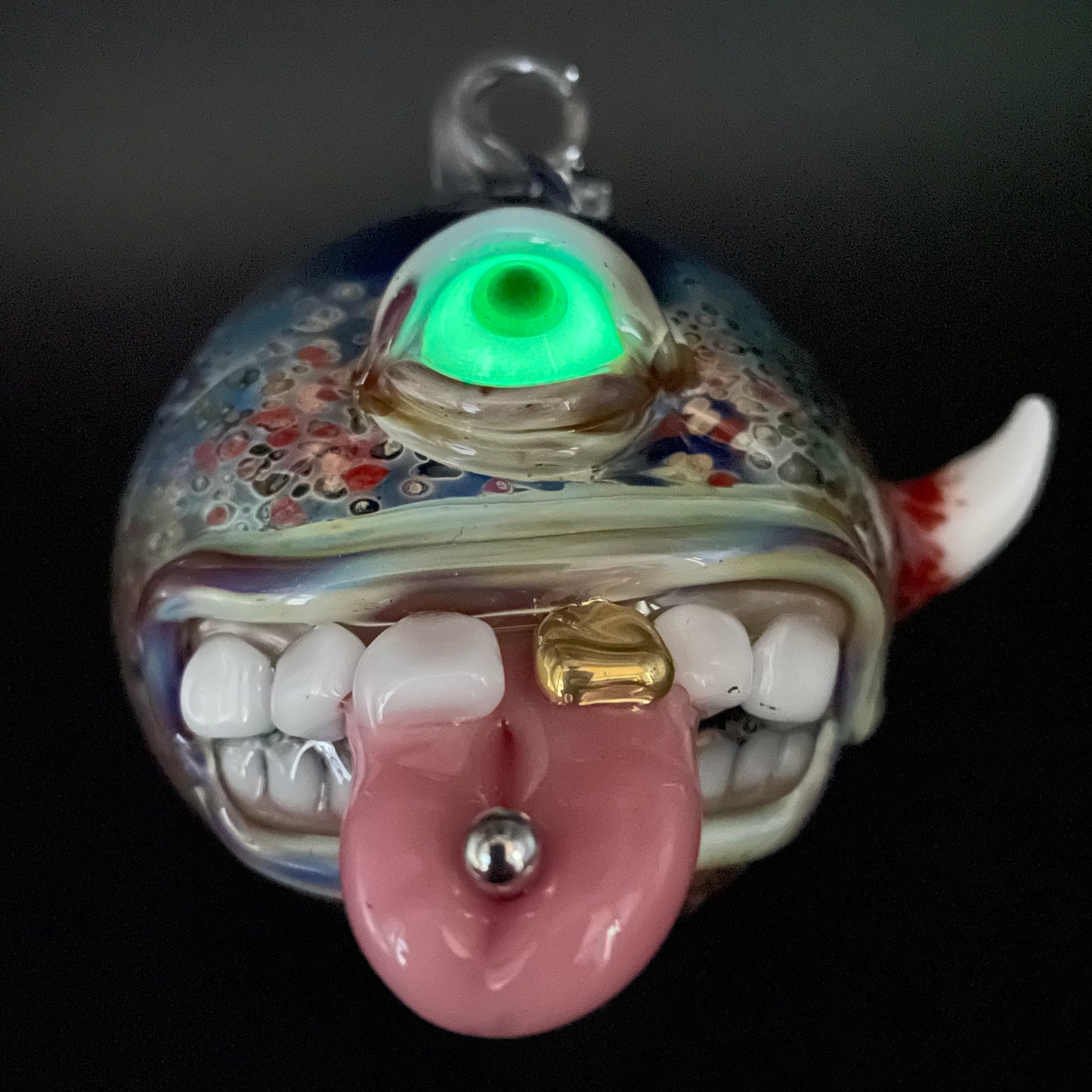 Pierced tongue cyclops ornament