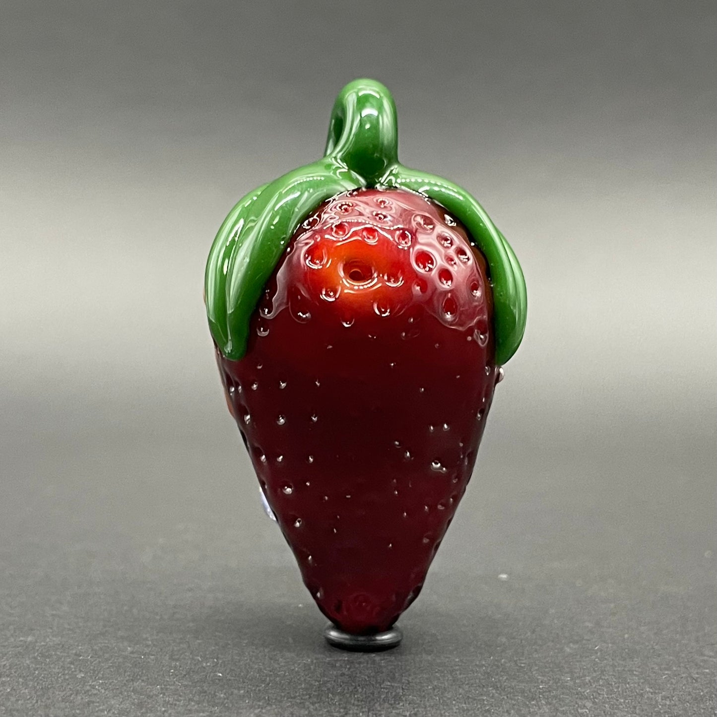 Toothy strawberry pendant