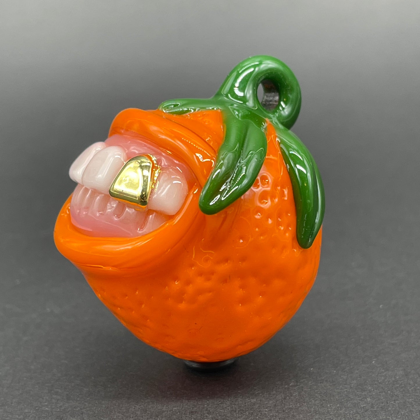 Toothy orange pendant