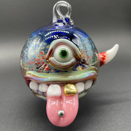 Pierced tongue cyclops ornament