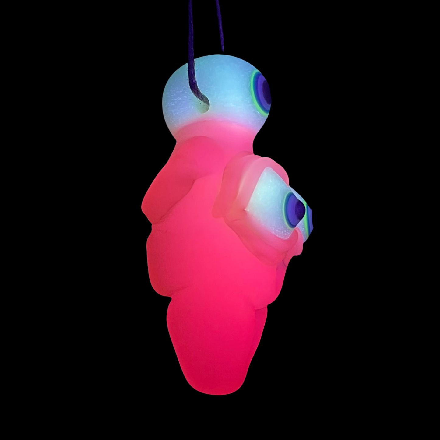 Black light reactive fertility pendant
