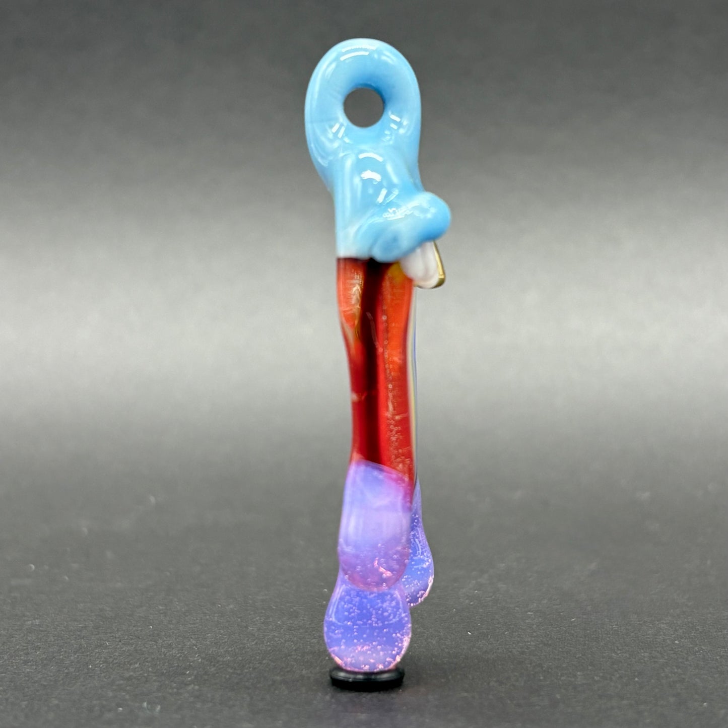 Drippy tongue rainbow tongue pendant