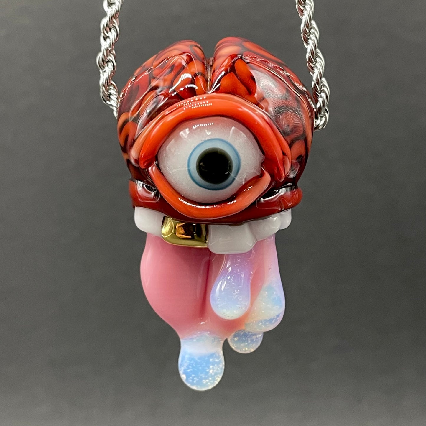 Mastermind glass pendant