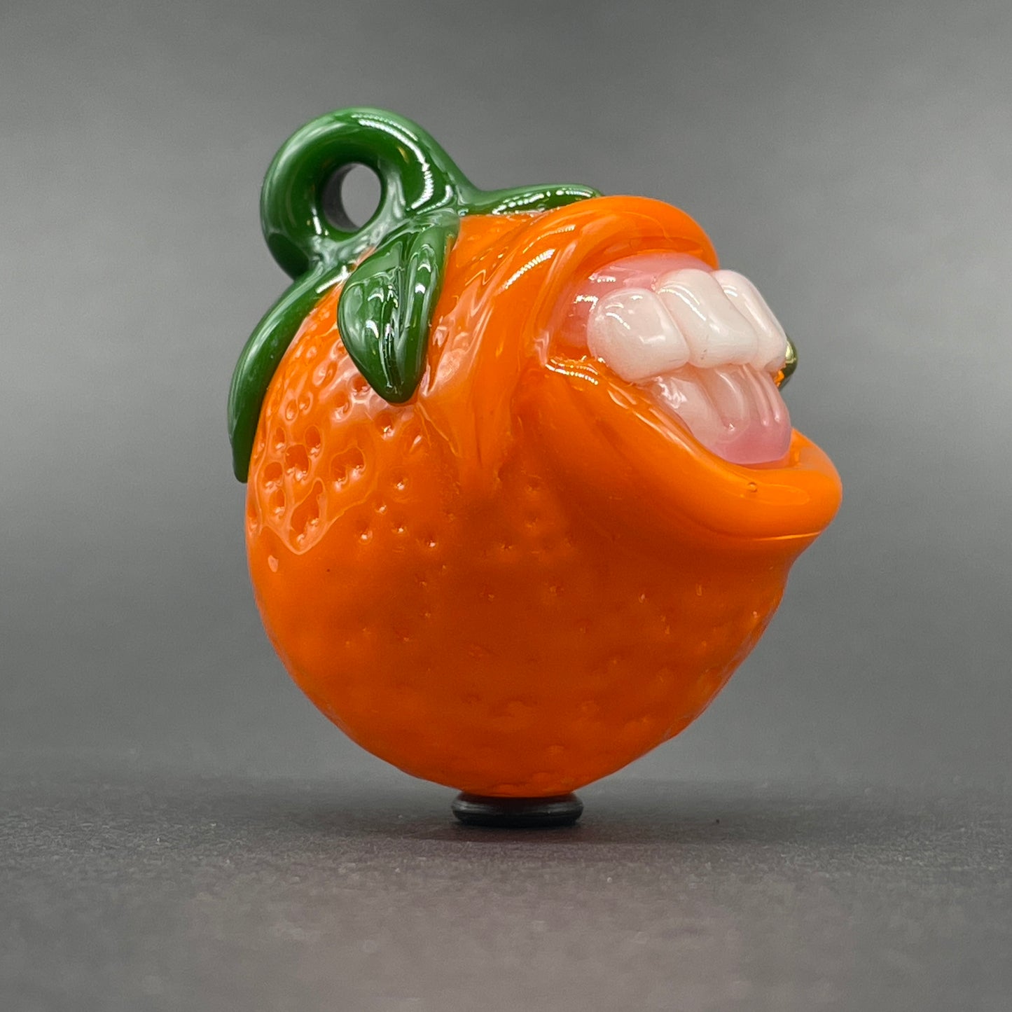 Toothy orange pendant