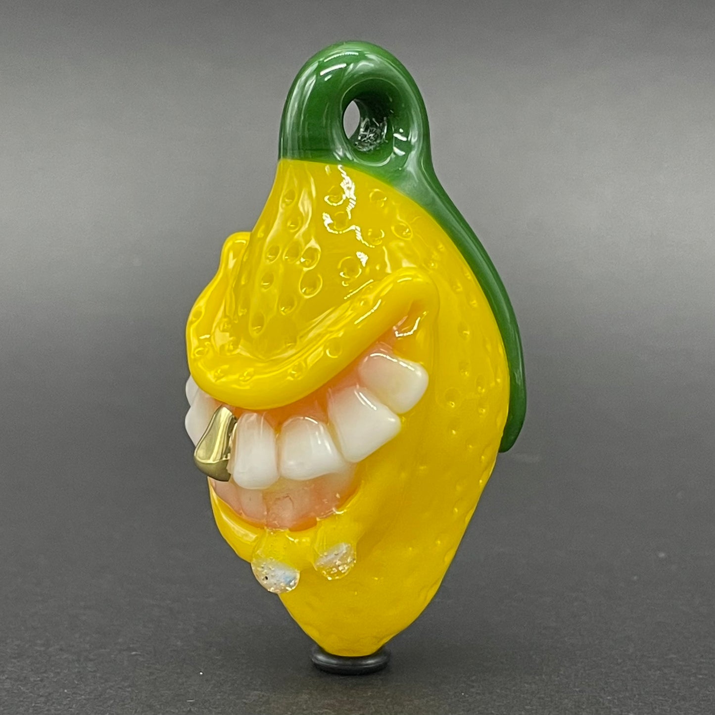 Grinning lemon pendant