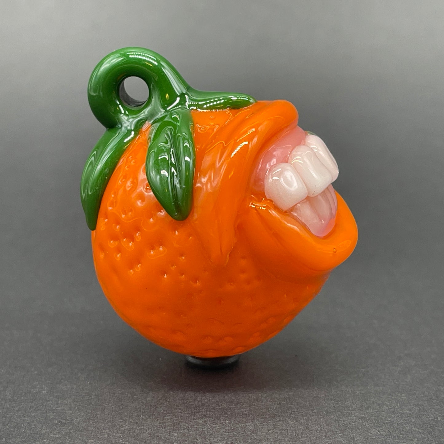 Toothy orange pendant