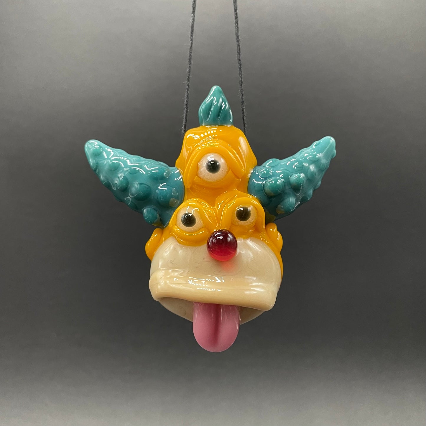 Third eye Krusty the clown glass pendant