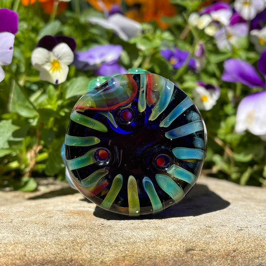 Rainbow cyclops plant pot with drainage holes