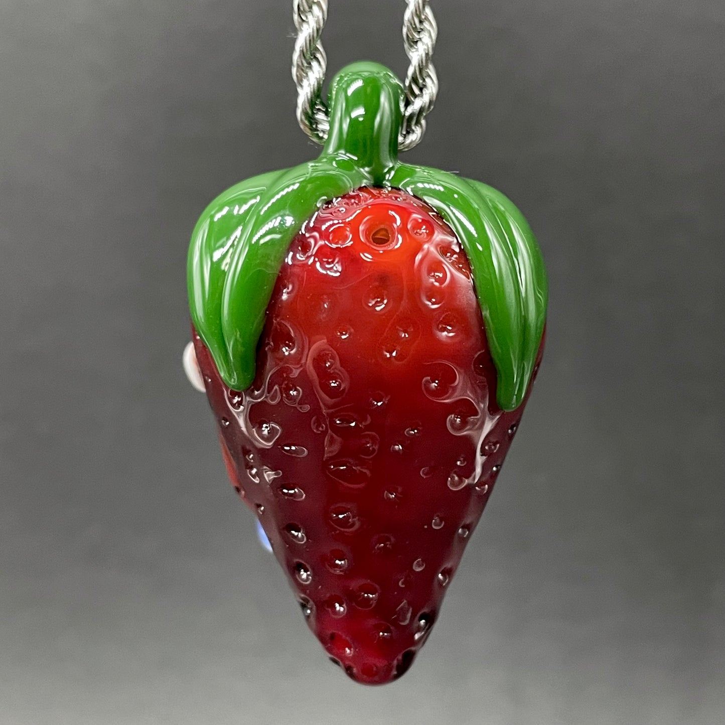 Toothy strawberry pendant
