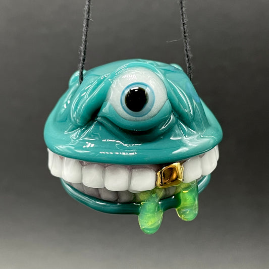 Grinning like a fool glass pendant