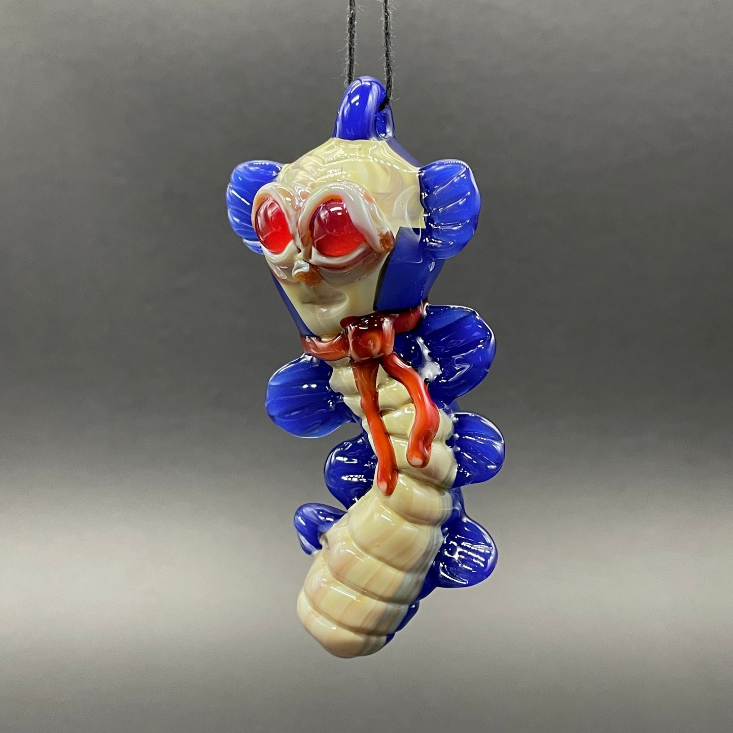 Labyrinth worm pendant