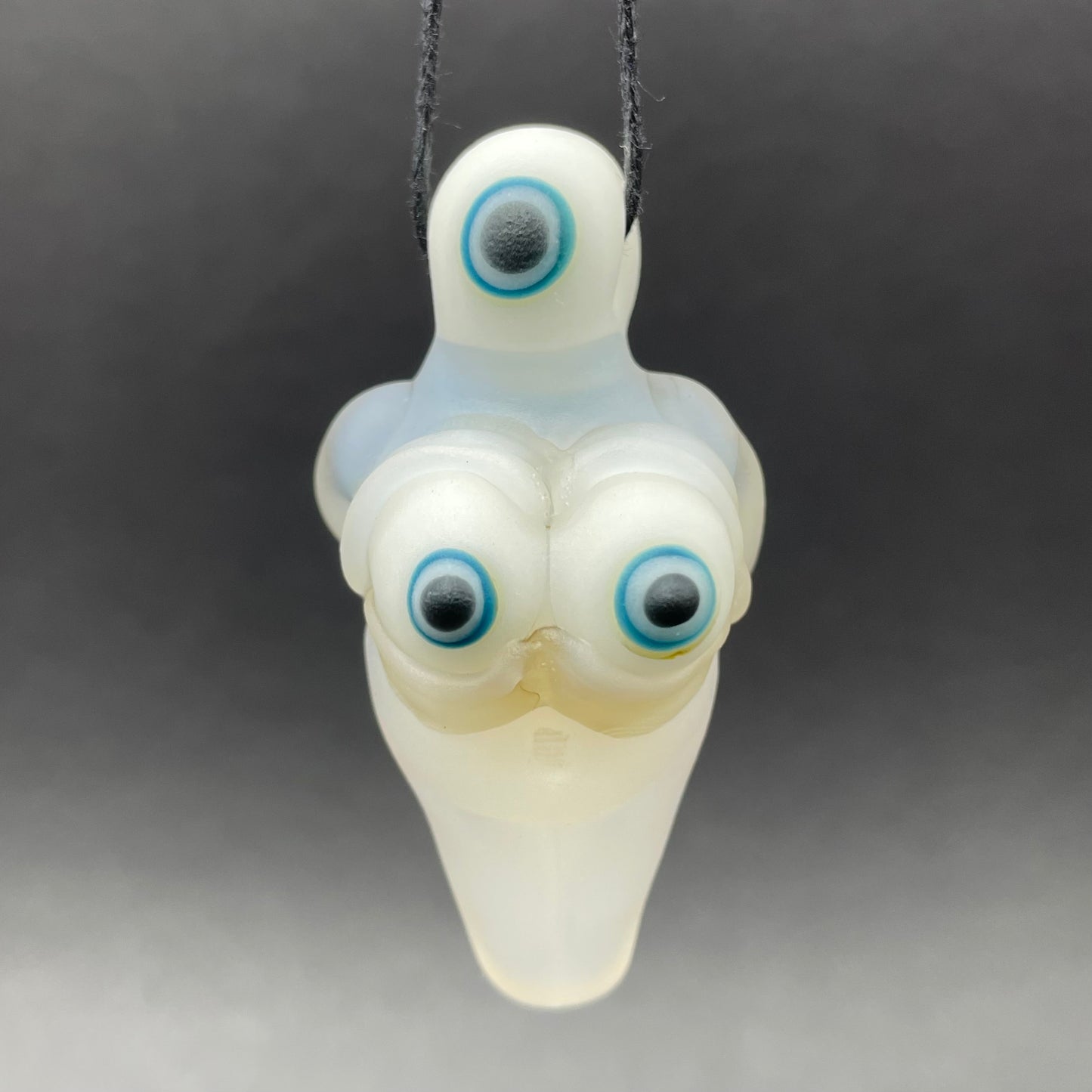 Black light reactive fertility pendant