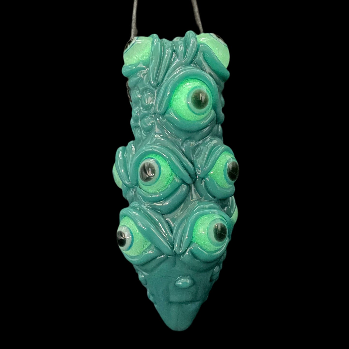 The Never-Blinking One glass effigy pendant