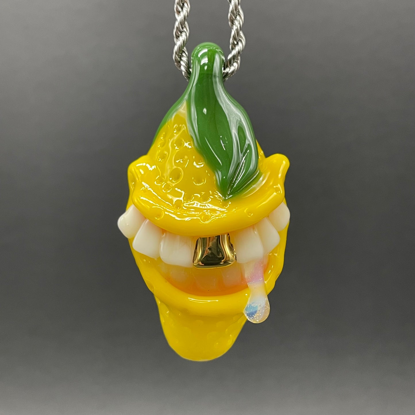 Grinning lemon pendant