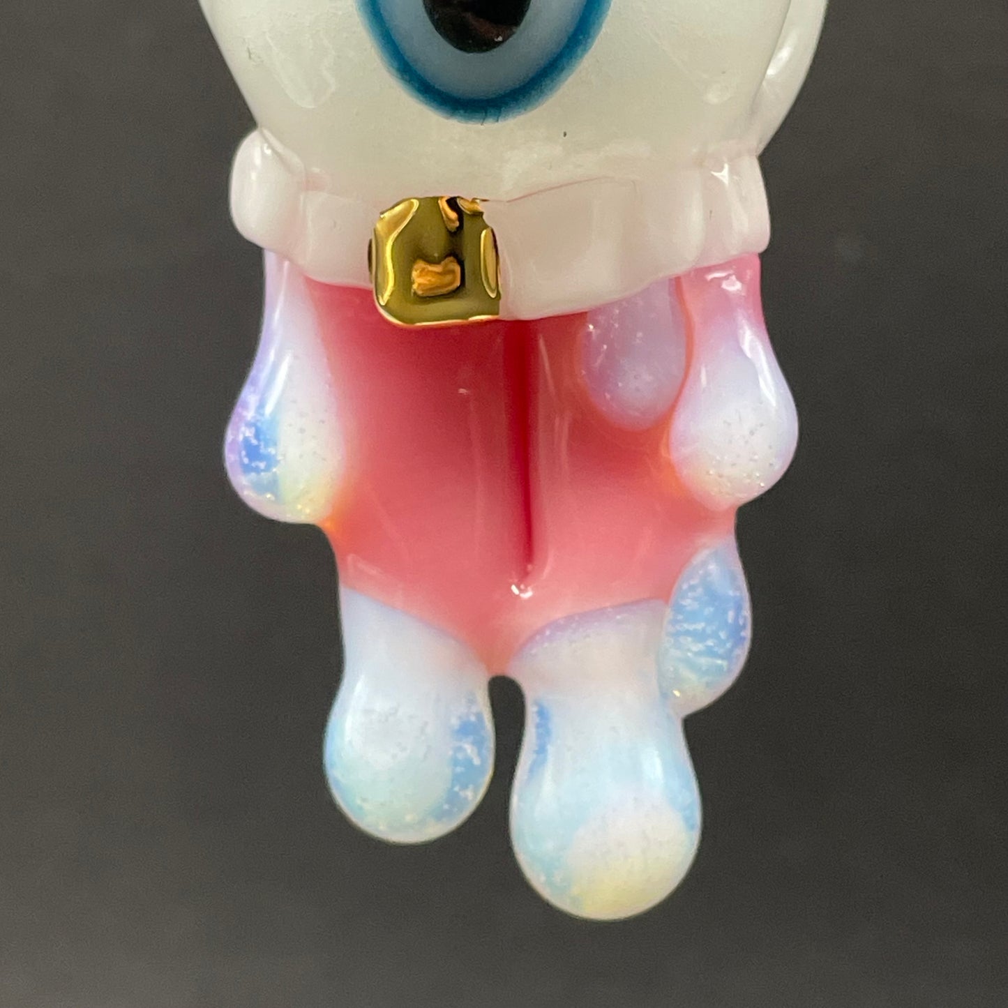 Glow in the dark eye pendant