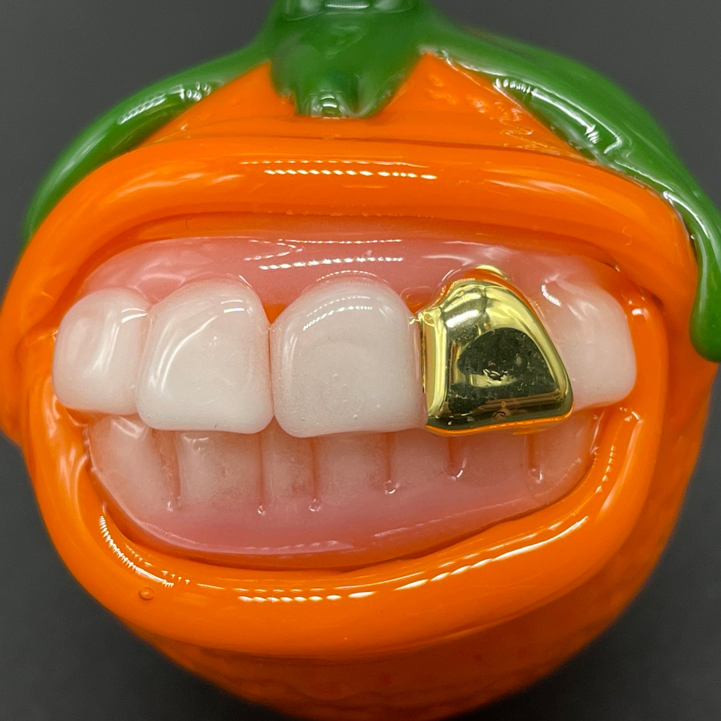 Toothy orange pendant