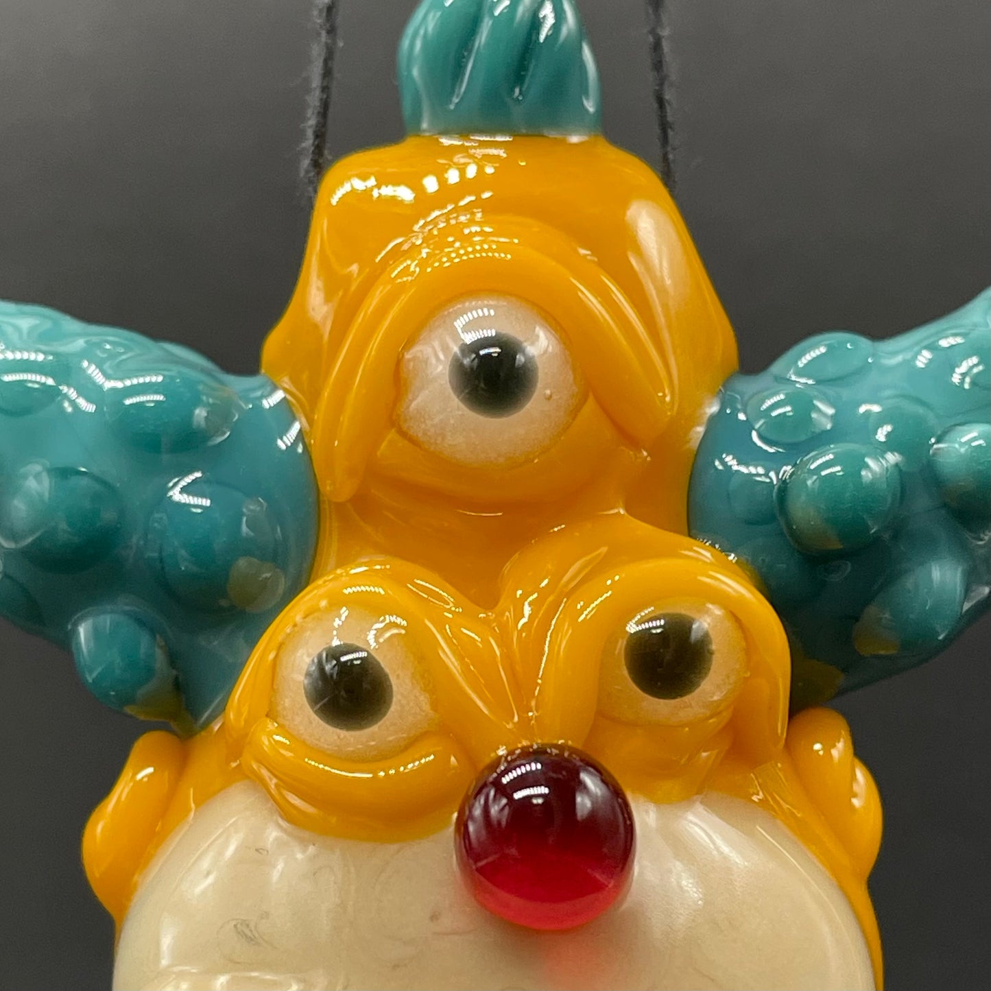 Third eye Krusty the clown glass pendant
