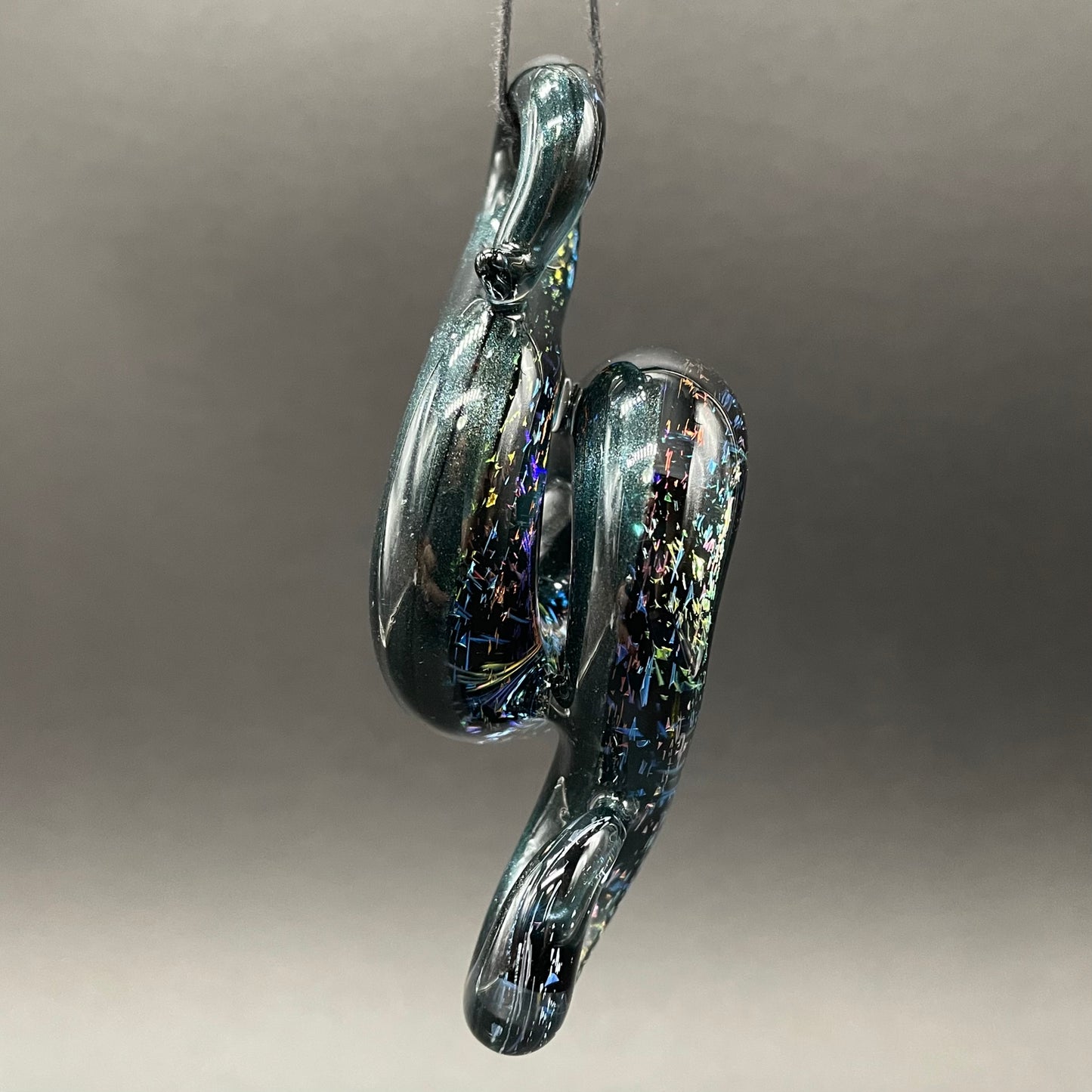 Dichroic sparkle snake pendant