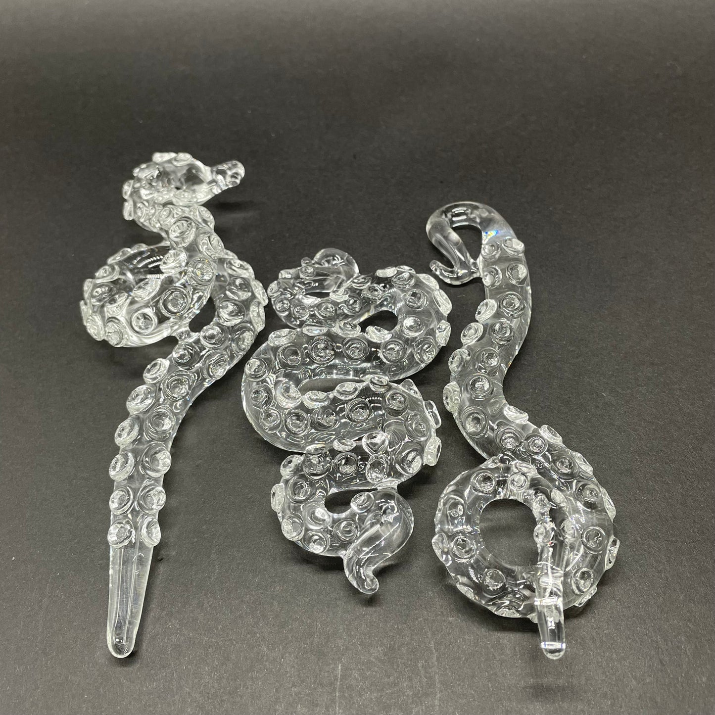 3 clear tentacle ornaments