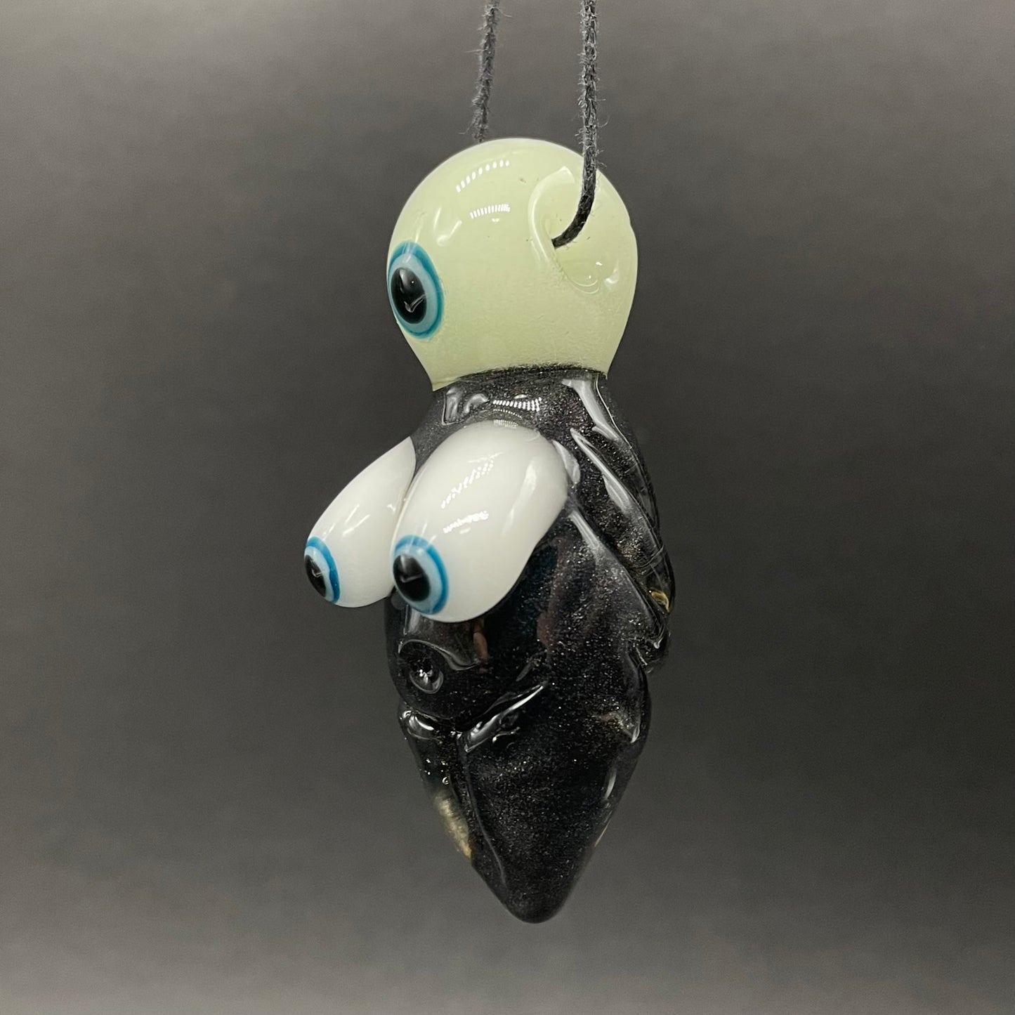 Black light reactive fertility pendant