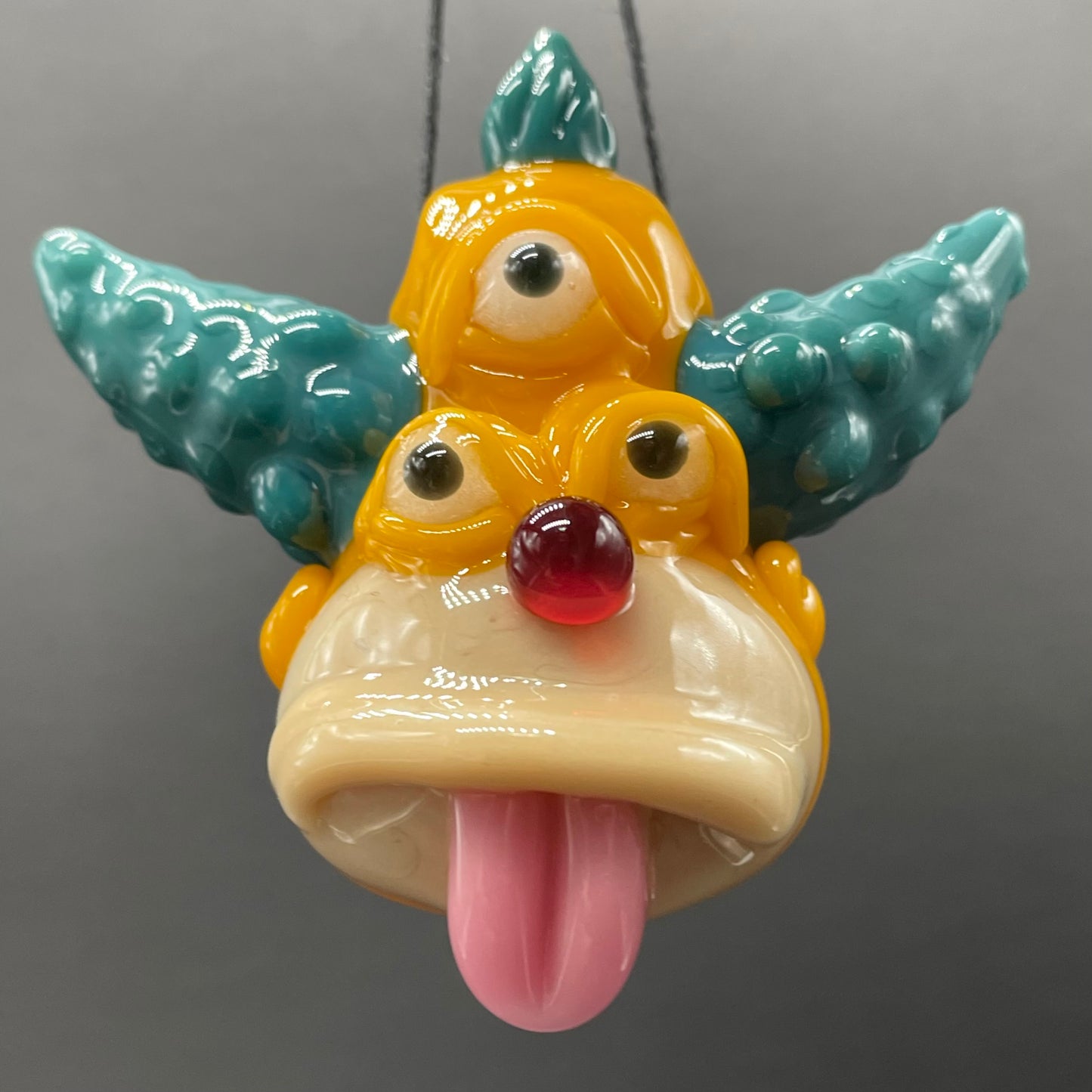 Third eye Krusty the clown glass pendant