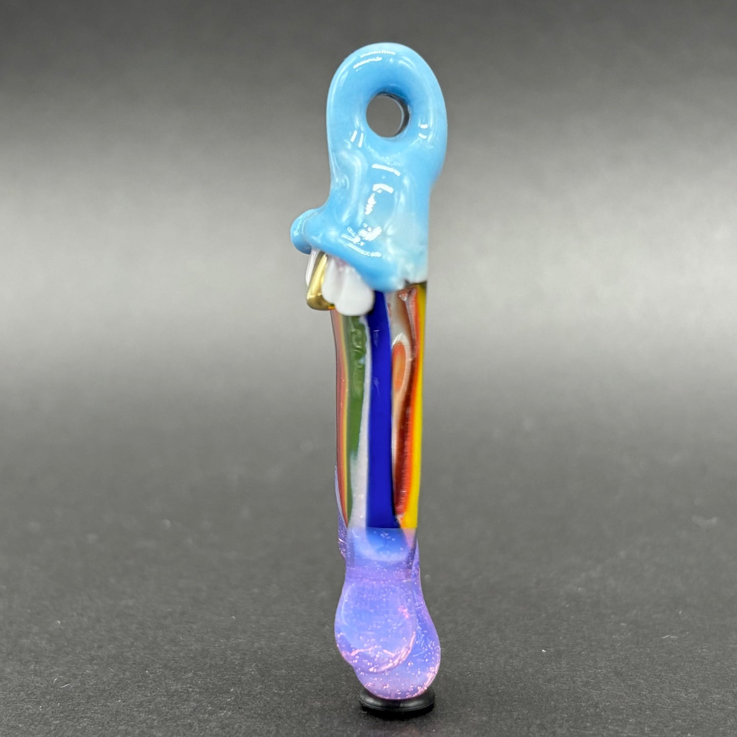 Drippy tongue rainbow tongue pendant