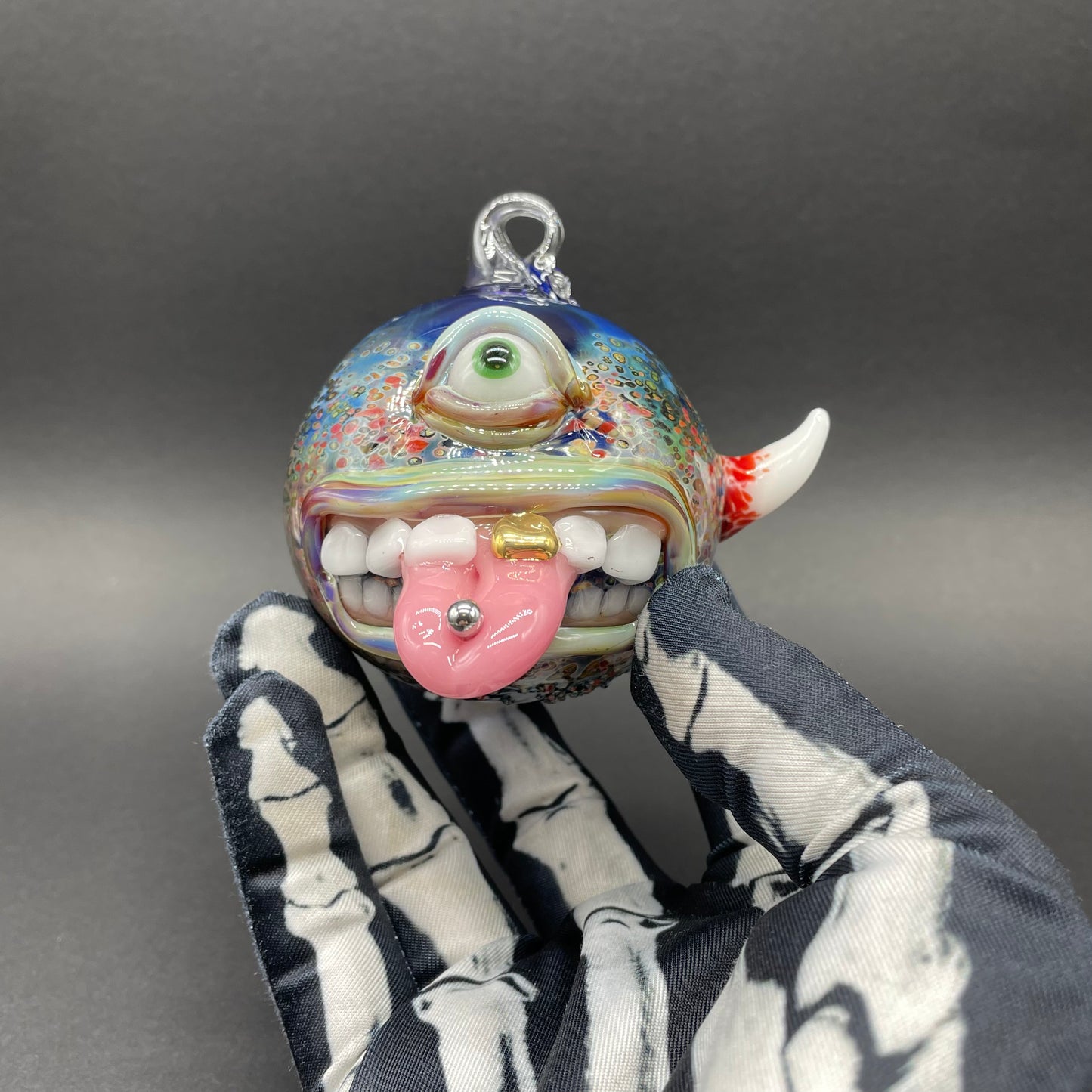 Pierced tongue cyclops ornament