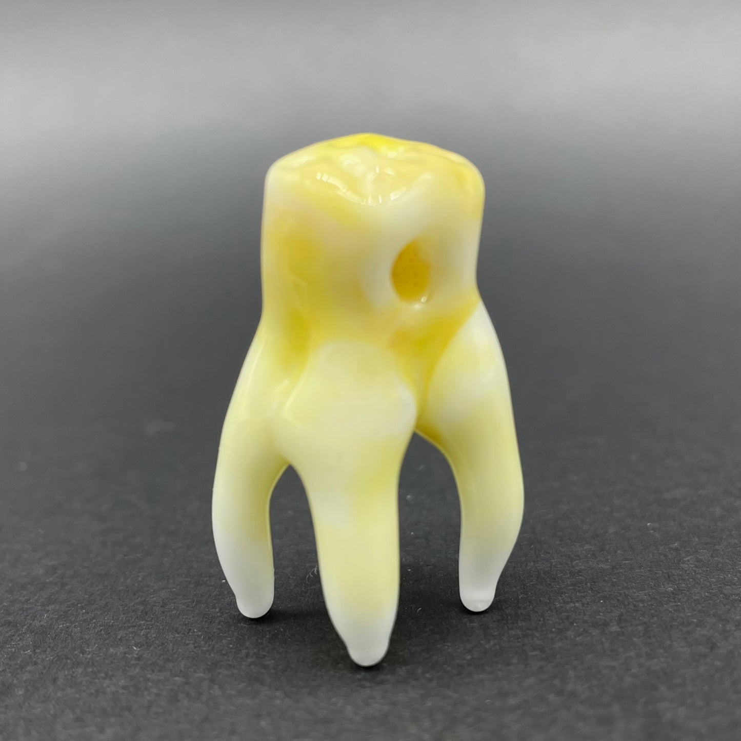 3 glass tooth beads