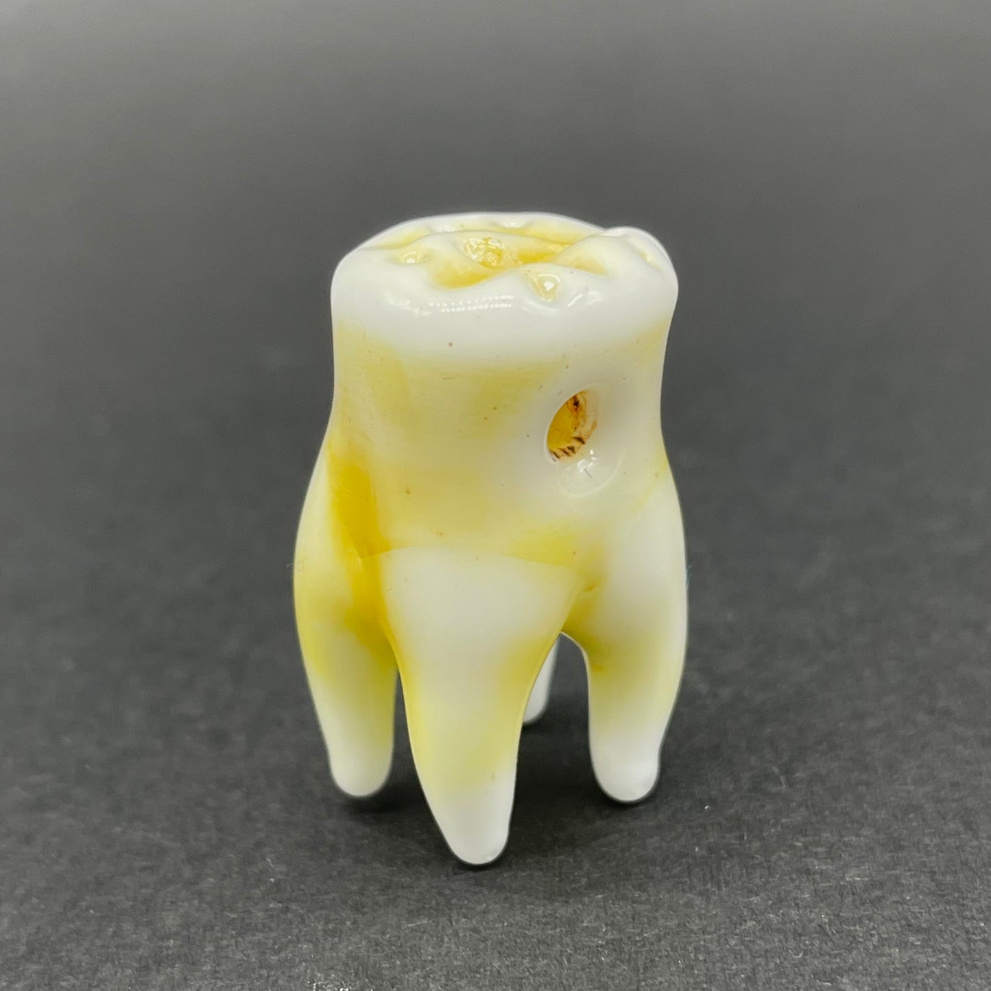 3 glass tooth beads