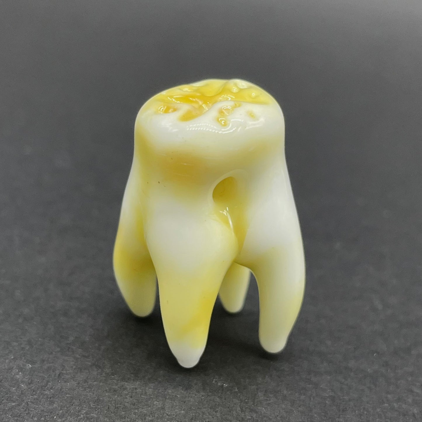 3 glass tooth beads