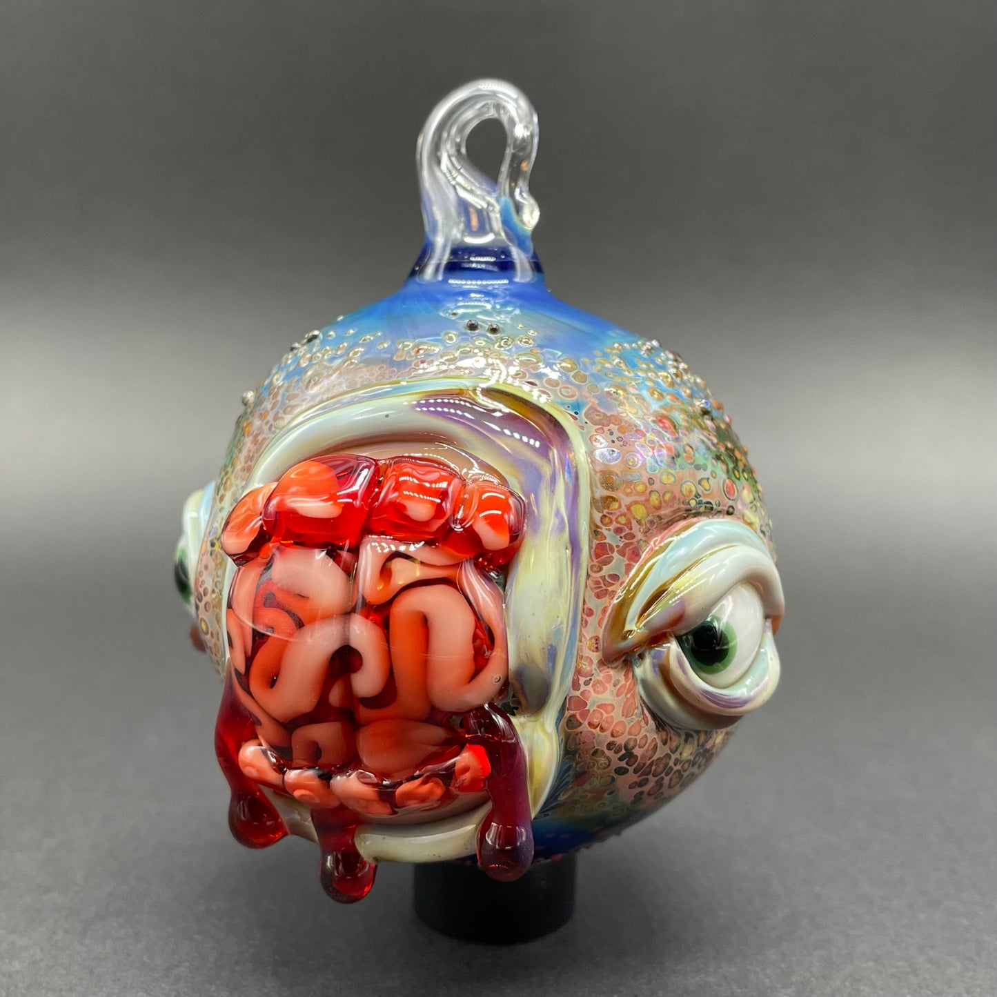 Brain eating zombie ornament