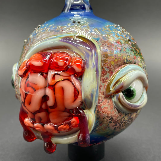 Brain eating zombie ornament