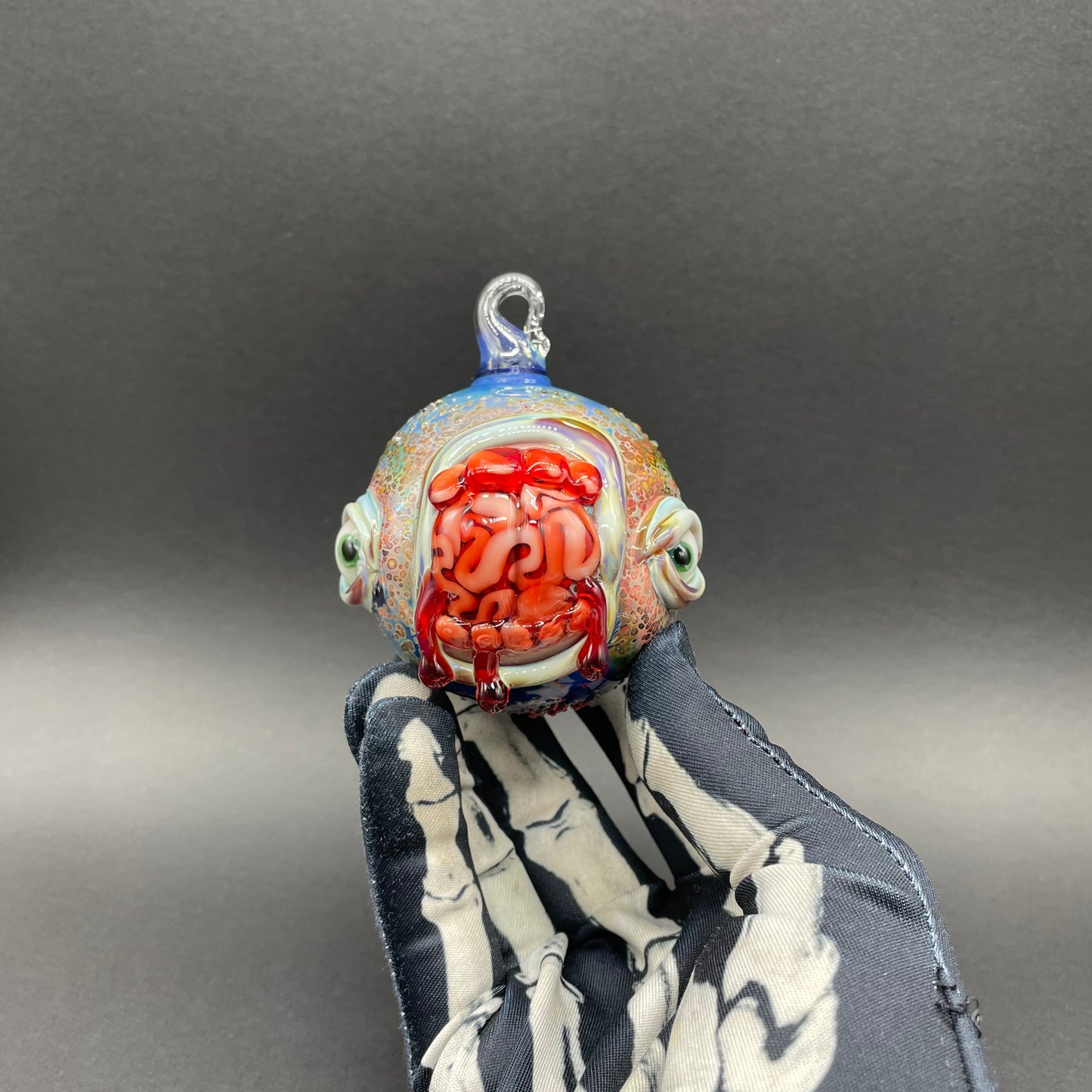 Brain eating zombie ornament