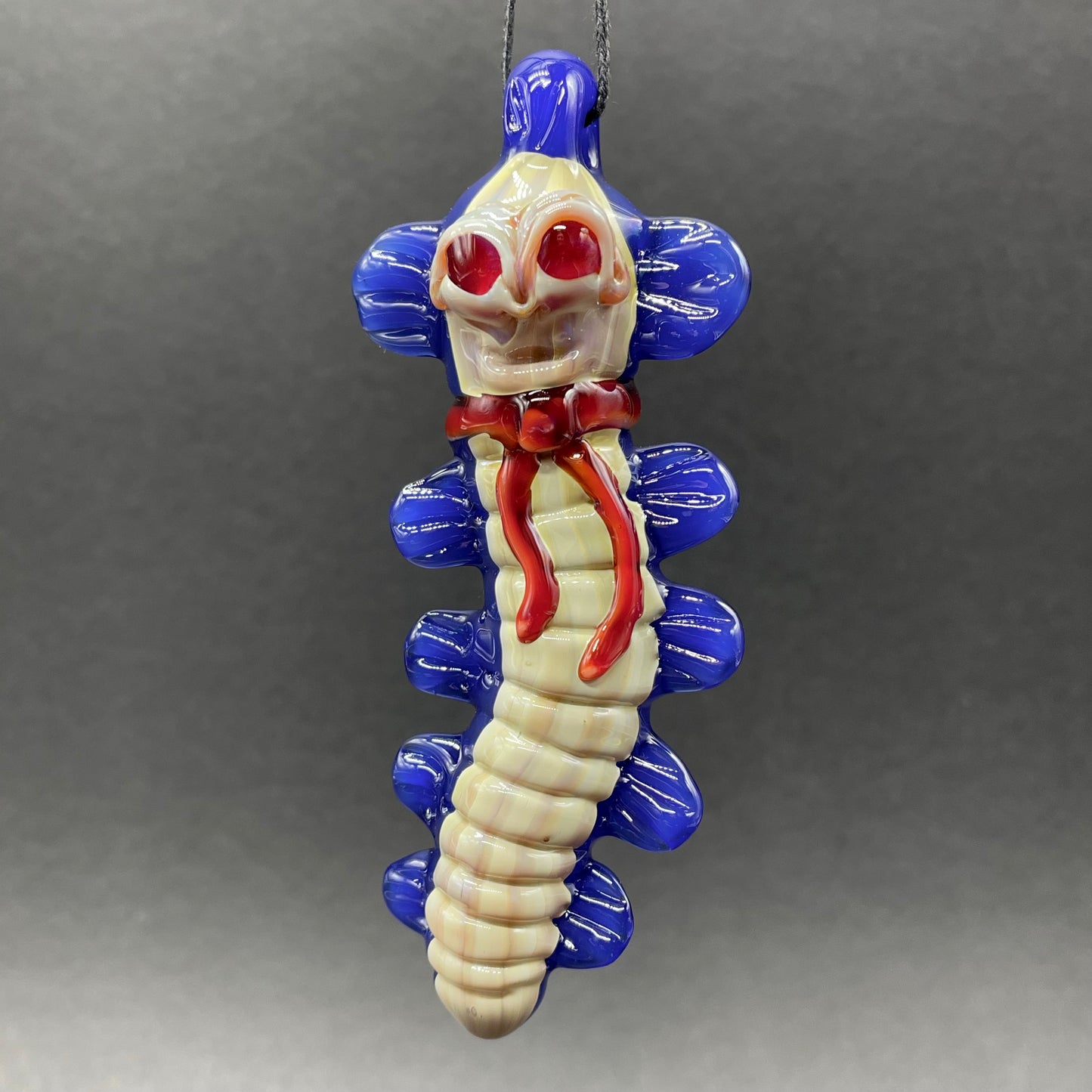 Labyrinth worm pendant