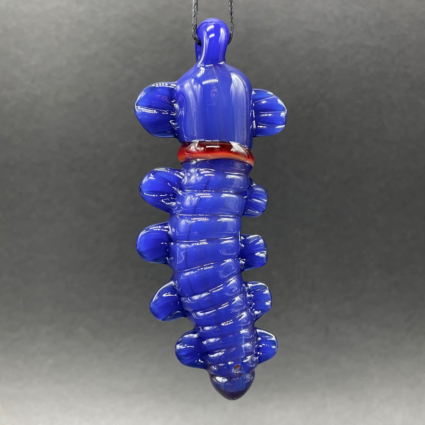 Labyrinth worm pendant