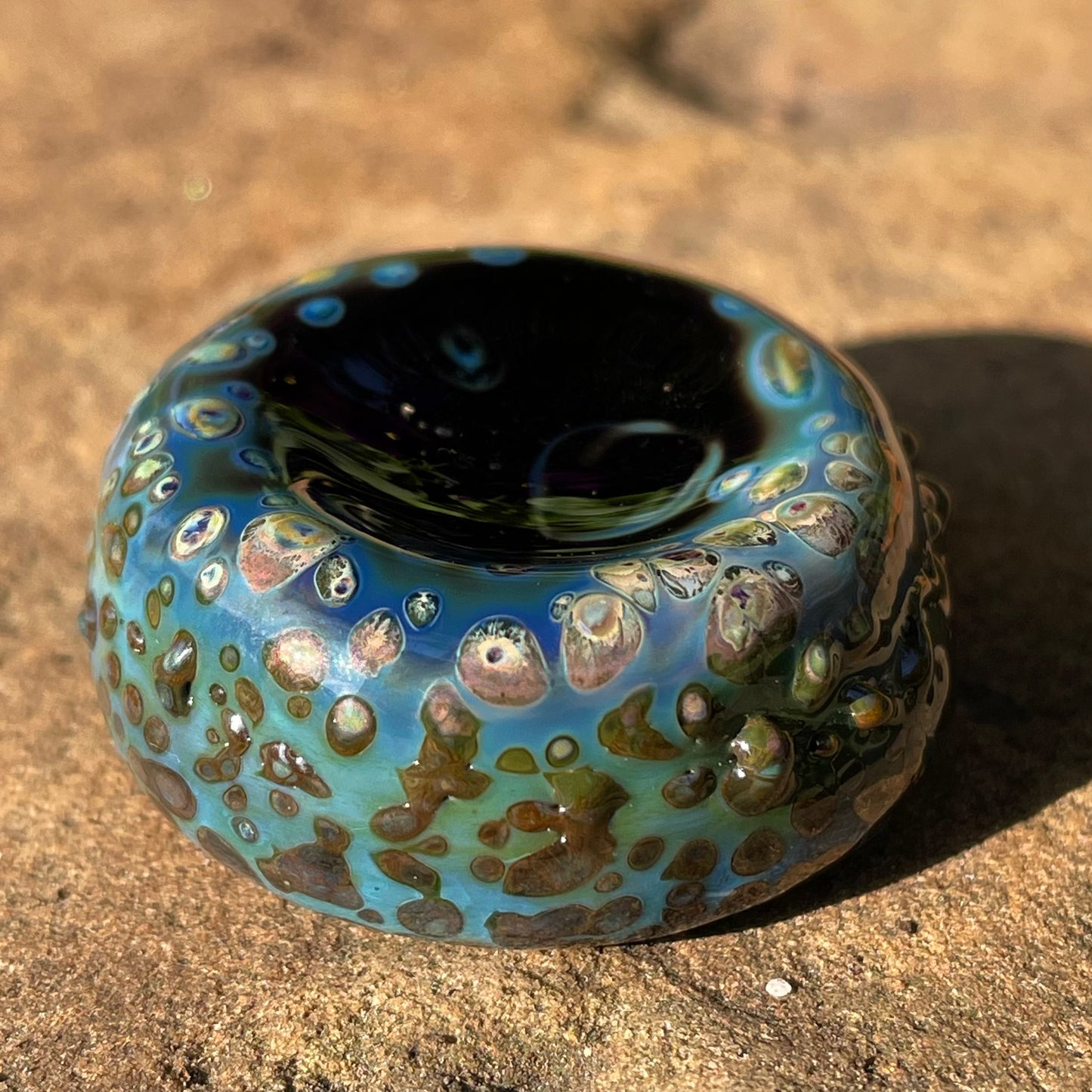 Red grinning glass cork bottle