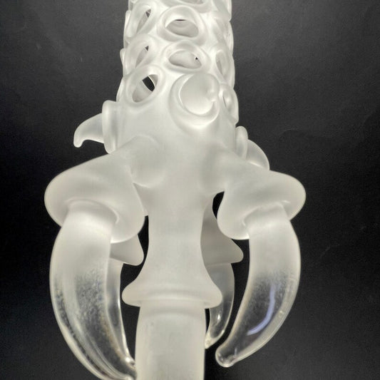 Glass claw sculpture