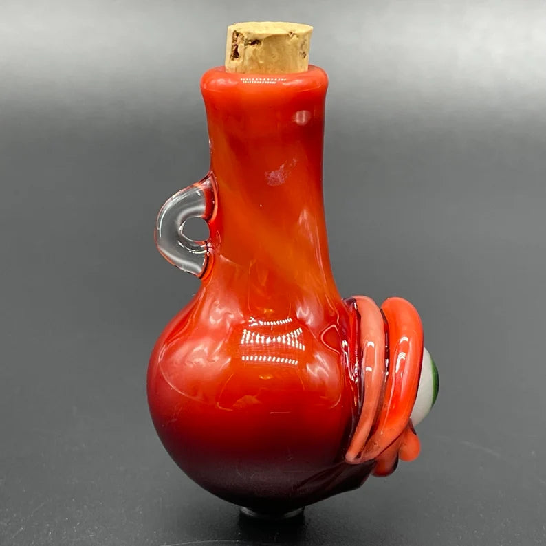Red over white cyclops potion bottle