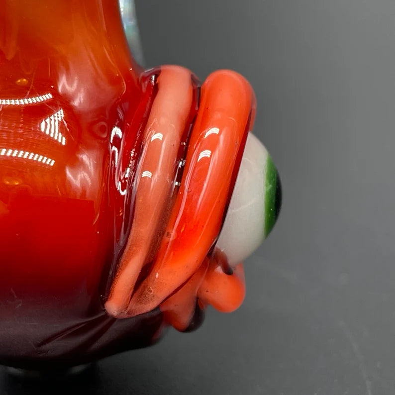 Red over white cyclops potion bottle