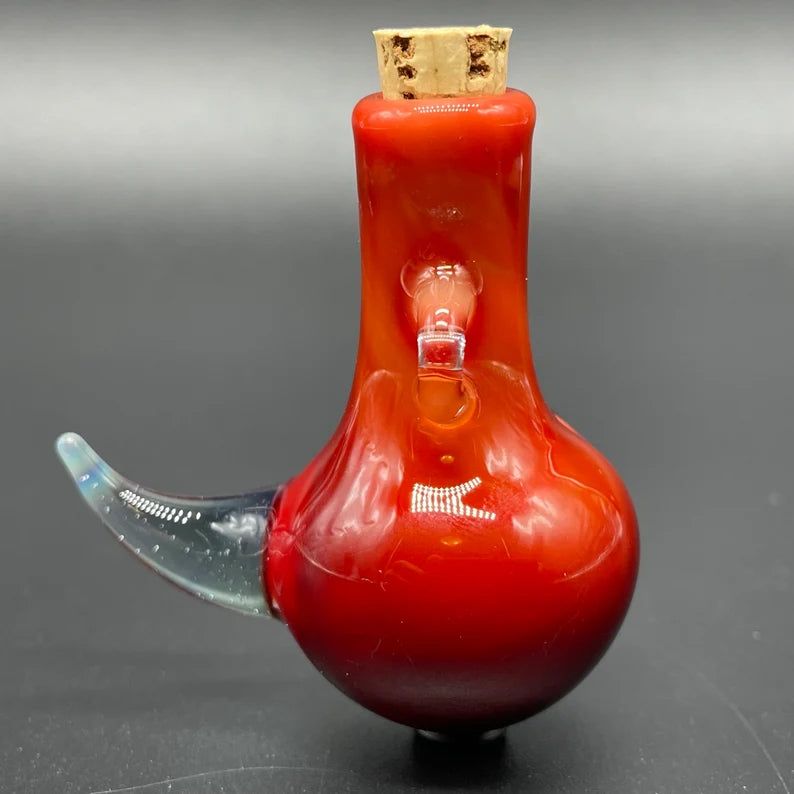Red over white cyclops potion bottle
