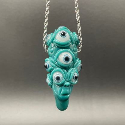 The Never-Blinking One glass effigy pendant