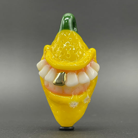 Grinning lemon pendant