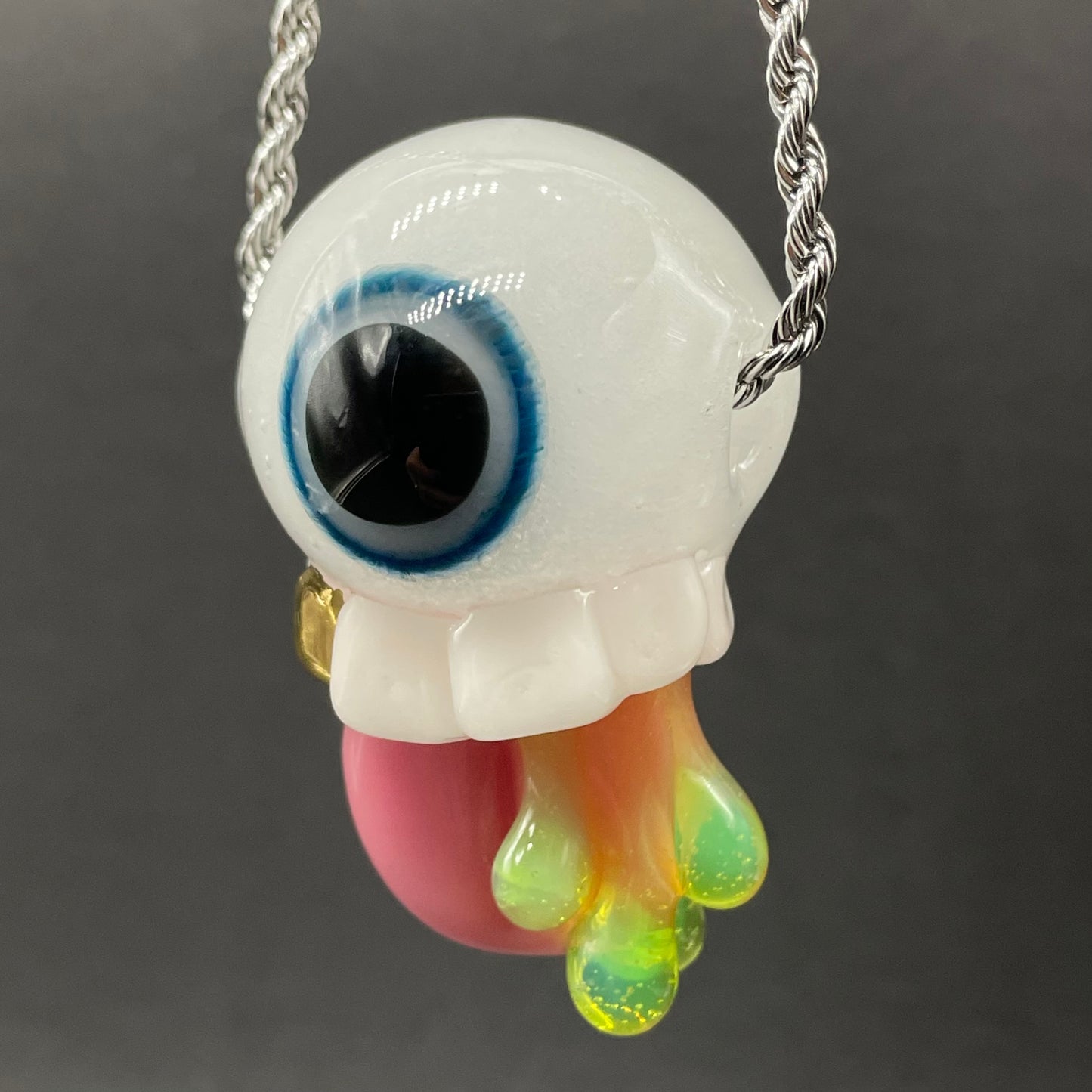 Glow in the dark eye pendant