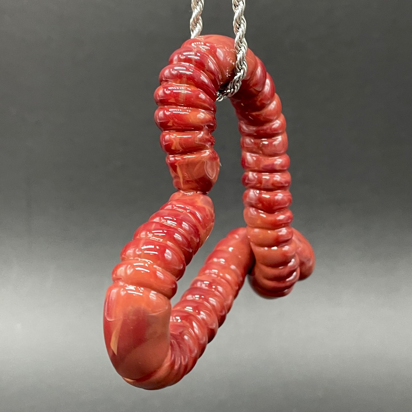 Leviathan Glass Large glass earthworm heart shaped pendant - hand-blown art