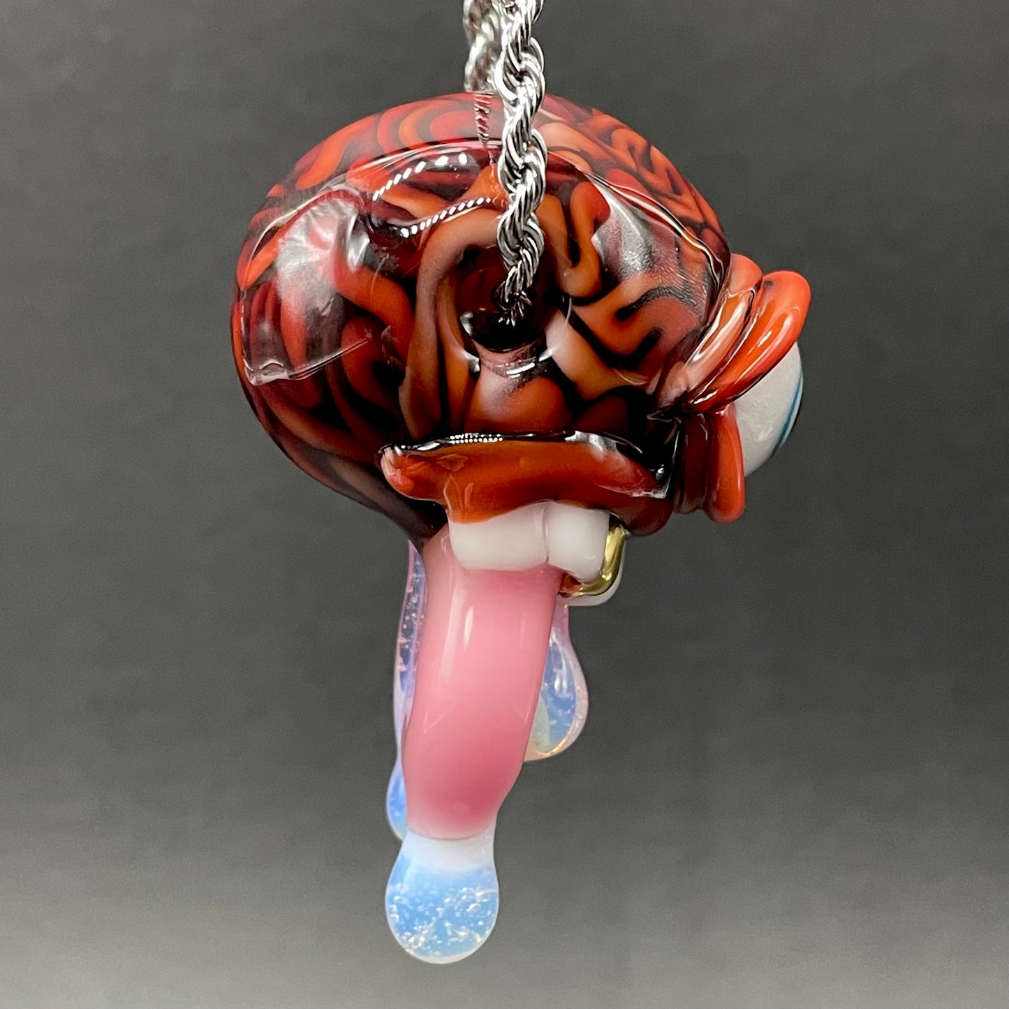Mastermind glass pendant